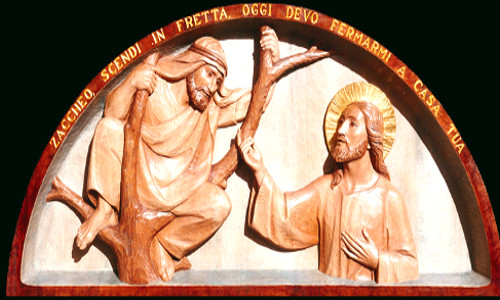 Peça em madeira mostrando Jesus e Zaqueu - Ferdinando Perathoner
