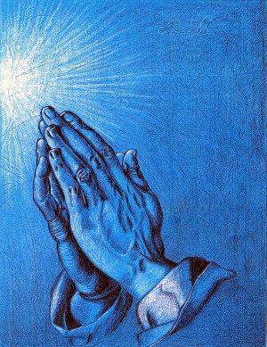 Mãos postadas em prece